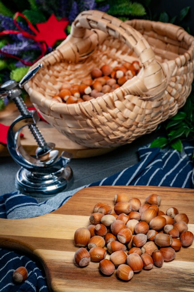 Hazelnuts in basket and on plate